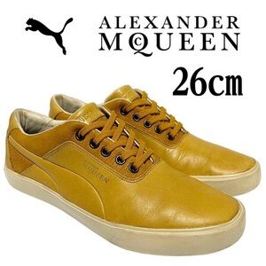 PUMA x Alexander McQueen Street Climb 3 Mid Leather sneakers in a mustard yellow